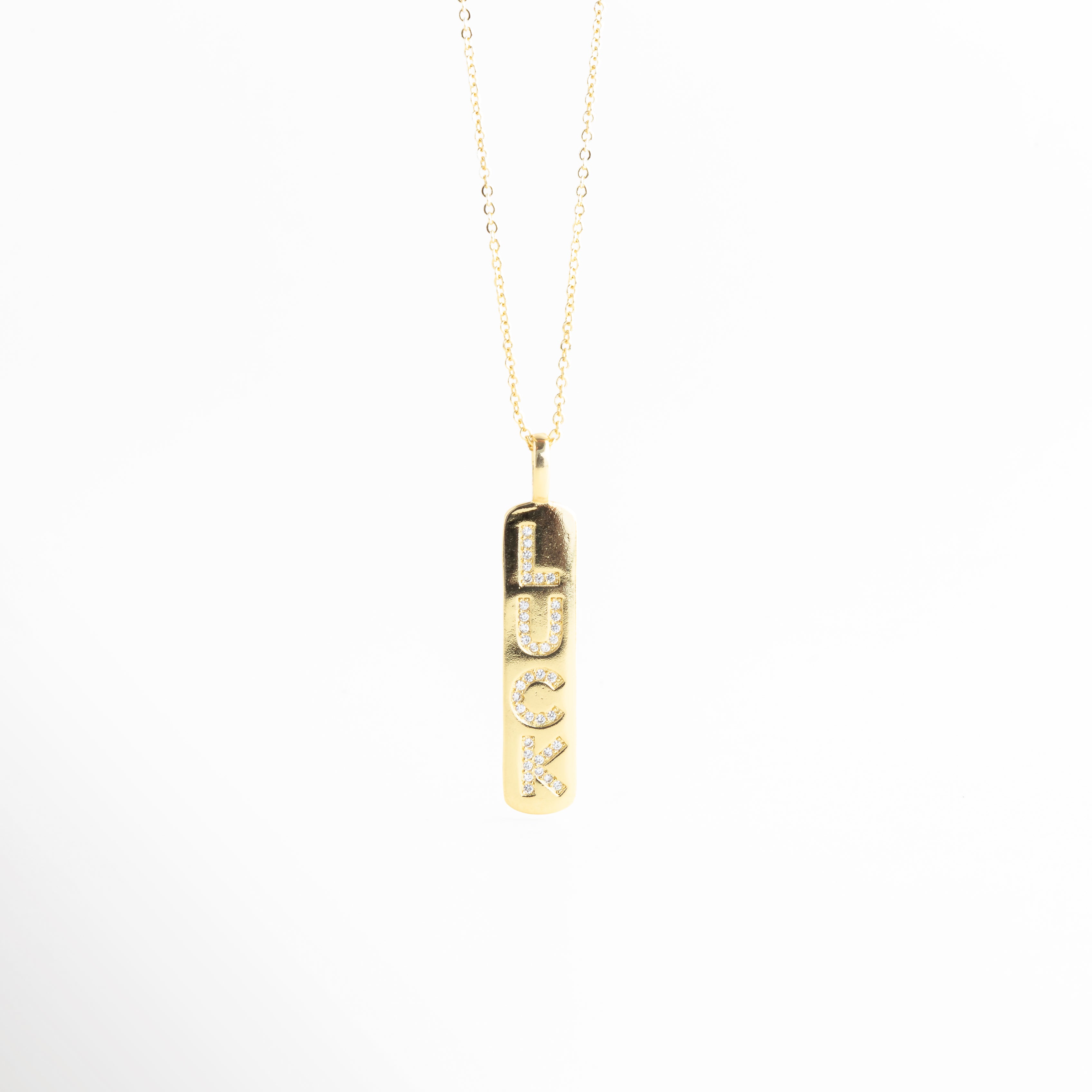 Collar dorado con dije vertical rectangular con zirconias brillantes, Collar minimalista barra dorada con incrustaciones de zirconia, Collar elegante chapado en oro con colgante largo de zirconias, Gargantilla fina con dije vertical dorado brillante con zirconias, Collar de cobre chapado en oro con colgante rectangular 4.3 cm