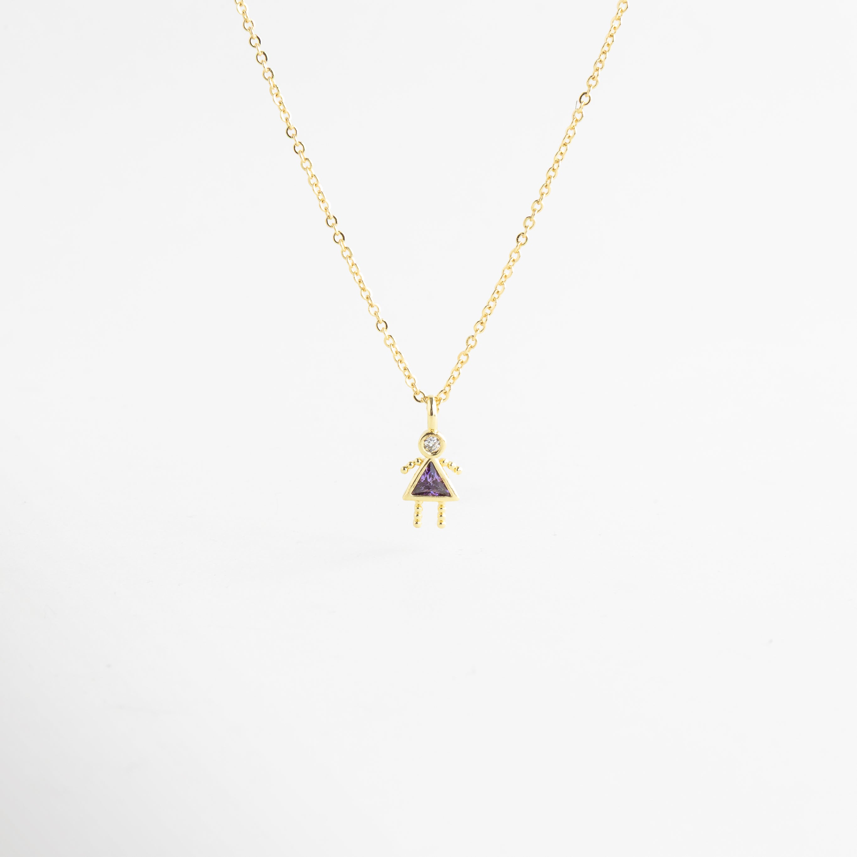 Collar dorado con dije de figura femenina y zirconias brillantes, Collar delicado con colgante de niña y detalles en zirconia, Collar en oro 18K con dije minimalista y piedra brillante, Collar fino dorado con figura estilizada y zirconias elegantes, Collar femenino con colgante pequeño y acabado brillante