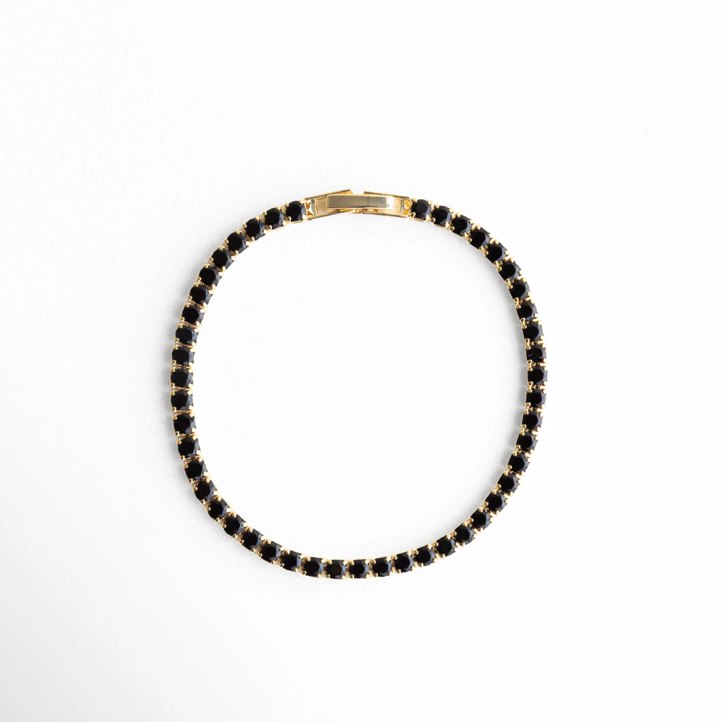 Pulsera completa con zirconias negras y baño en oro blanco 18K, diseño elegante, Pulsera tipo tenis negra con forma circular, estilo minimalista sofisticado, Pulsera de cobre con recubrimiento en oro blanco y piedras negras brillantes, Pulsera elegante para mujer con zirconias negras, diseño versátil, Pulsera fina de 0.3 cm con zirconias oscuras, ideal para cualquier ocasión