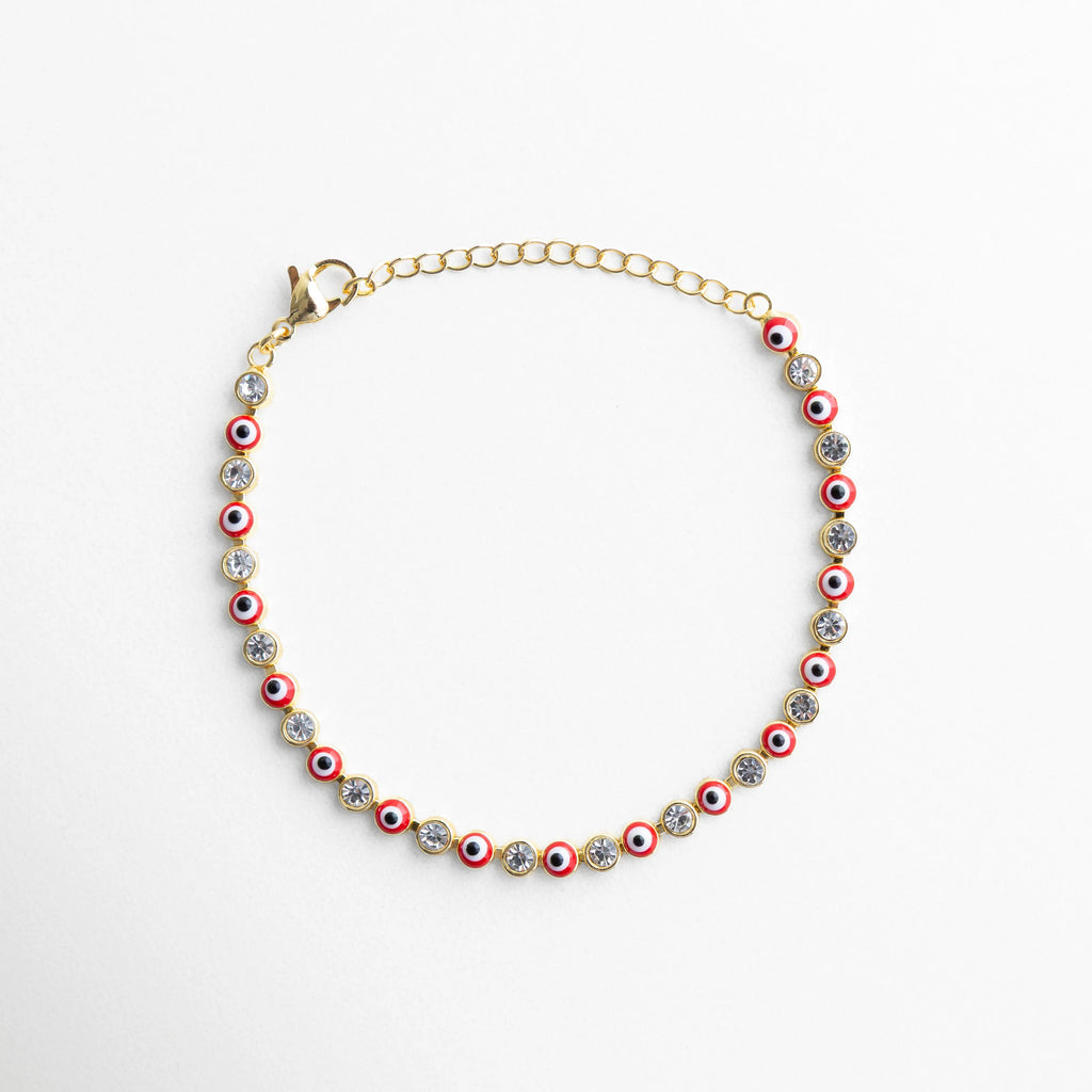 Pulsera ojitos rojos dorada con piedras brillantes y diseño de ojo turco, Pulsera de ojos turcos rojos con acabado dorado y estilo elegante, Pulsera fina dorada con ojitos rojos y piedras brillantes mujer, Pulsera ojitos roja con diseño vibrante y acabado en oro 18K, Pulsera de protección con ojos turcos rojos y detalles brillantes
