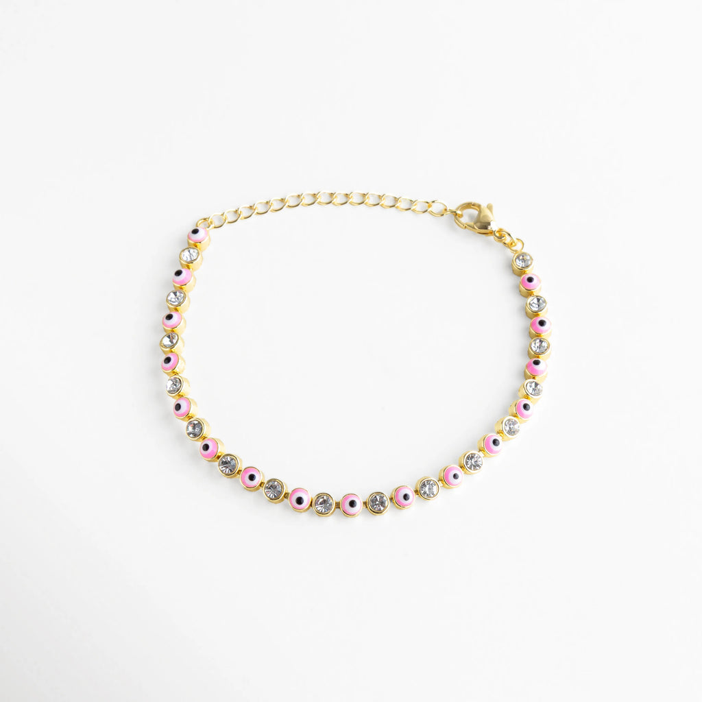 Pulsera ajustable de ojitos rosas con cristales incrustados, ideal para usar sola o combinar con otras piezas.