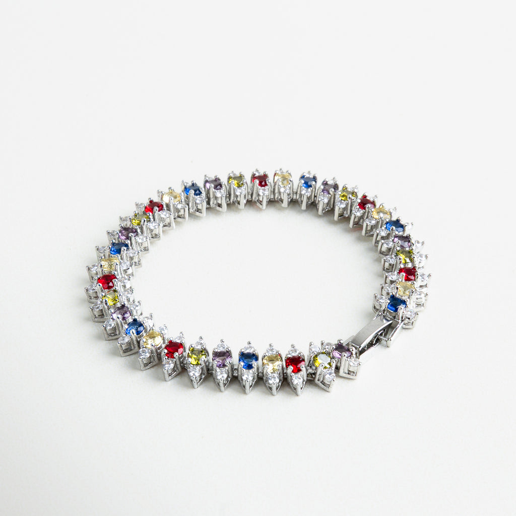 Pulsera dorada con zirconias multicolor, Pulsera de chapa de oro 18K con circonitas de colores, Pulsera elegante y vibrante con piedras brillantes, Diseño de pulsera colorida con brillo sofisticado