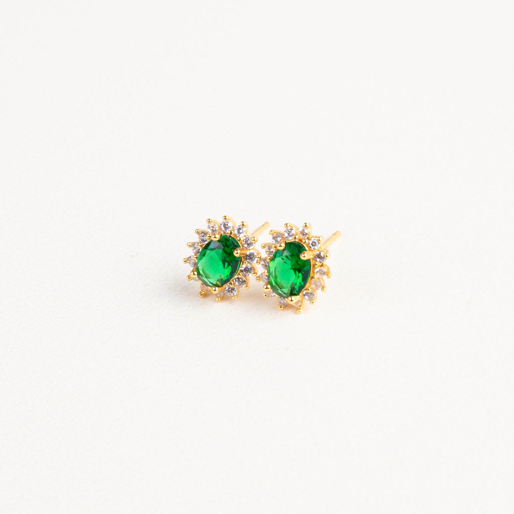 aretes dorados con piedra verde