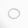 pulsera de cuentas plateadas medianas, diseño elástico y elegante, Pulsera plateada minimalista con esferas medianas, estilo moderno y versátil.