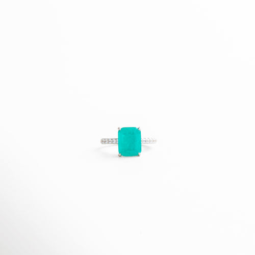 Anillo minimalista en oro blanco con piedras preciosas y diamante Turmalina de Paraíba, diseño delicado y elegante que aporta un toque de lujo sutil y sofisticado