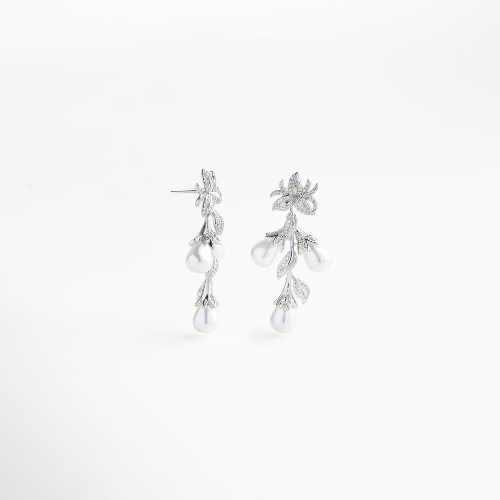 reverso de los aretes, acabado pulido y uniforme, estructura resistente y cómoda de llevar, diseño pensado para uso prolongado, detalles refinados que mantienen la estética