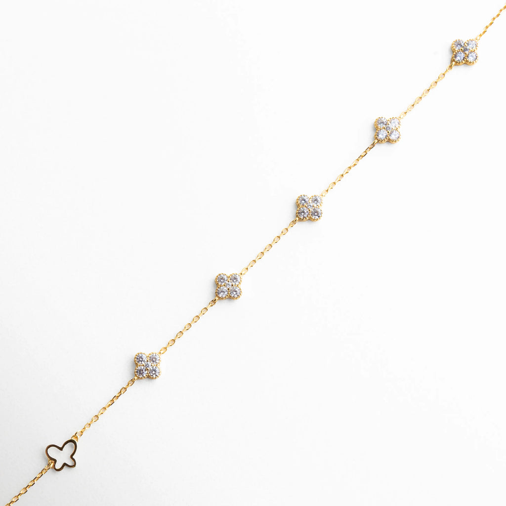 pulsera dorada delicada, pulsera con detalles geométricos, joyería dorada elegante, pulsera fina mujer, accesorios sofisticados, joyería minimal, pulsera moderna, joyería atemporal