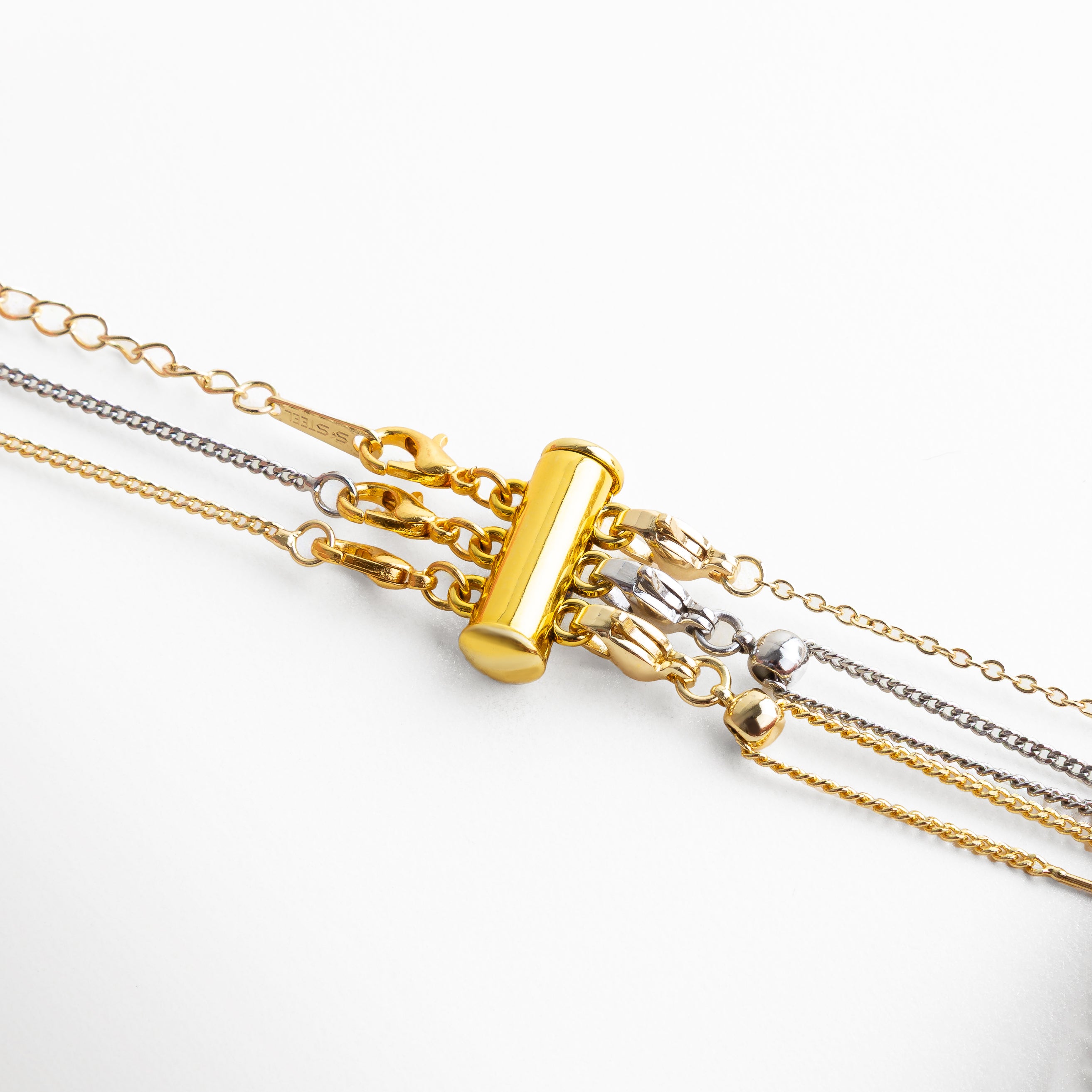 clip para layering de collares dorado joyería en San Pedro Garza García accesorio para collares múltiples elegante moderno