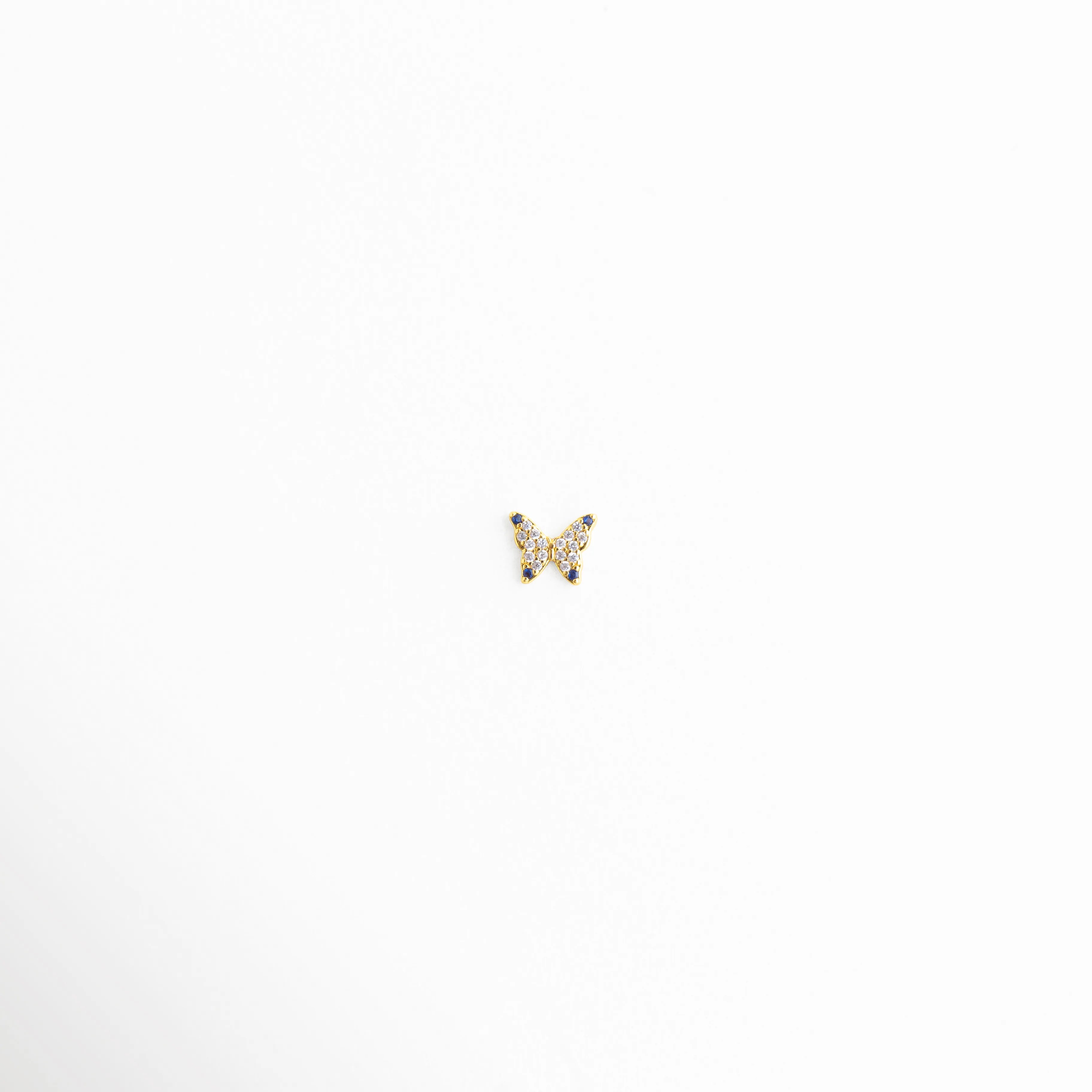 Charm de mariposa con diseño delicado y acabado brillante elegante, Charm mariposa con alas detalladas y estilo femenino sofisticado, Charm mini mariposa con diseño elegante y brillo sutil, Charm de mariposa con acabado luminoso y estilo delicado, Charm mariposa con diseño moderno y toque glam femenino