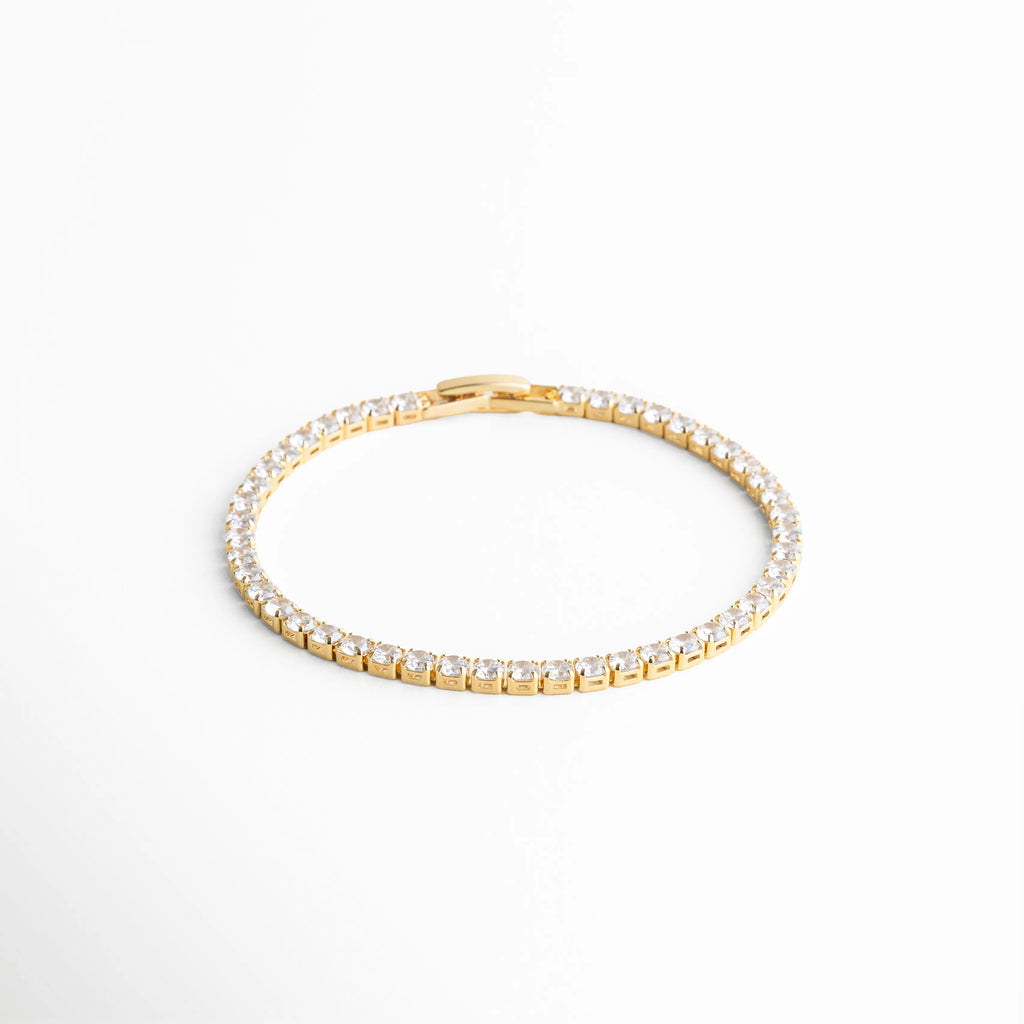 pulsera tennis circular, joyería plateada minimal, pulsera elegante mujer, accesorios plateados clásicos, pulsera chic diaria, joyería sofisticada, pulsera fina plateada, pulsera atemporal