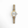 Reloj Bronte para mujer con carátula rectangular y acabado en oro y oro blanco de estilo elegante, Vista frontal del Reloj Bronte en acero inoxidable con diseño sofisticado y detalles brillantes, Reloj femenino Bronte con carátula refinada y combinación de tonos oro y oro blanco, Reloj elegante de mujer con acabado bicolor en oro y oro blanco, ideal para looks sofisticados, Carátula del Reloj Bronte con diseño atemporal, femenino y acabado brillante en acero inoxidable