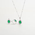 set de joyería plateado con piedra verde, collar y aretes plateados elegantes, conjunto de joyas verde esmeralda, joyería plateada con cristales, set de collar y aretes para regalo, accesorios de fiesta plateados